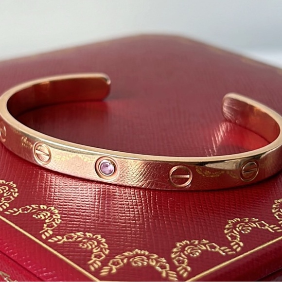 Cartier Jewelry - Rare Cartier love cuff with pink sapphire